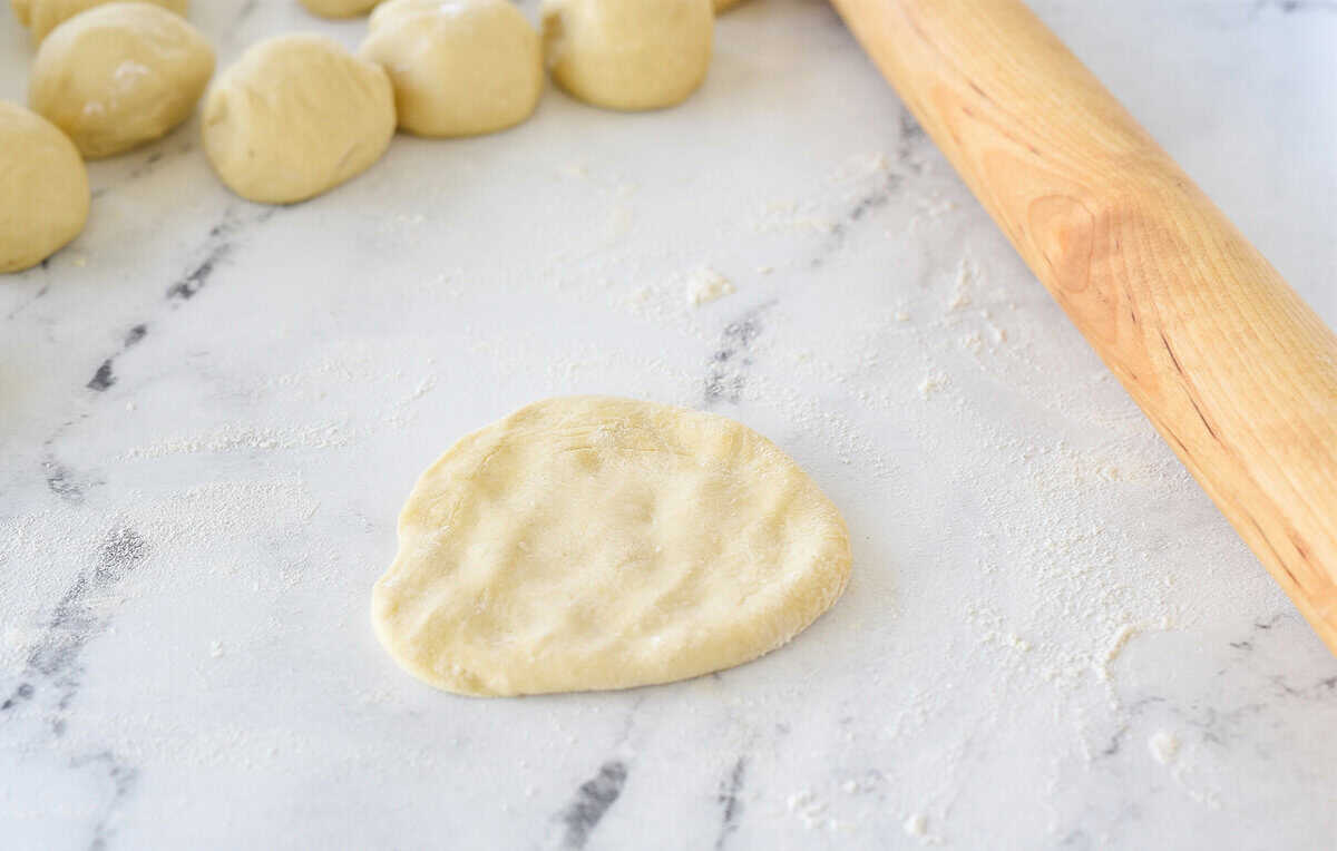 flatten ball of tortilla dough
