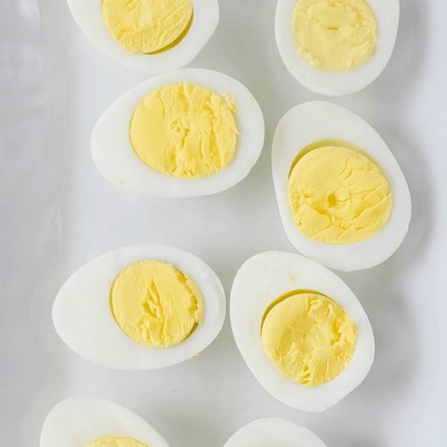 sliced open hard boiled eggs