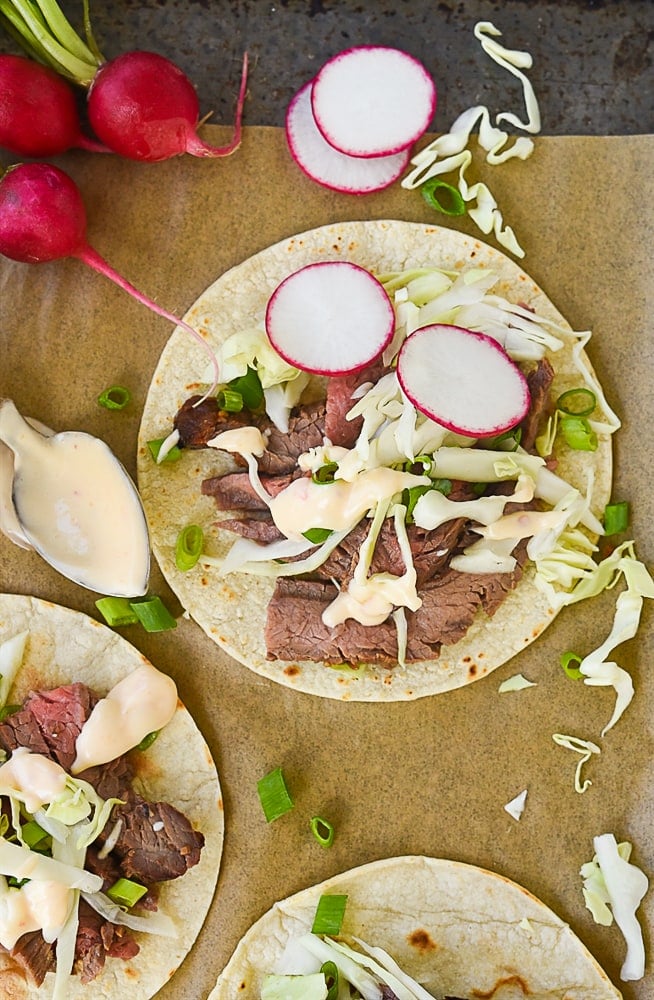 Korean Beef Tacos korean taco on brown paper