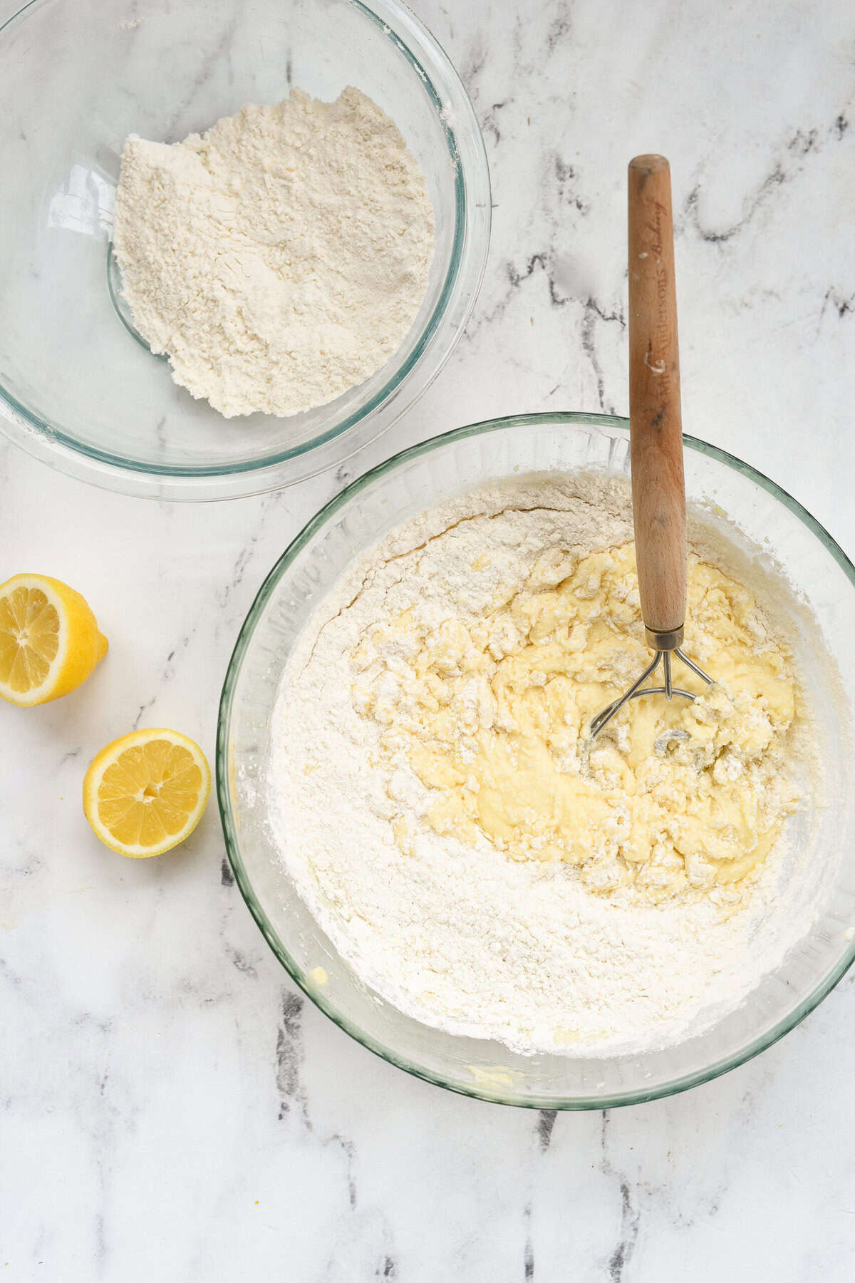 adding flour and eggs into cake batter