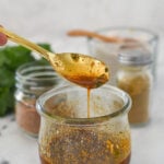 spoonful of taco salad dressing and a jar